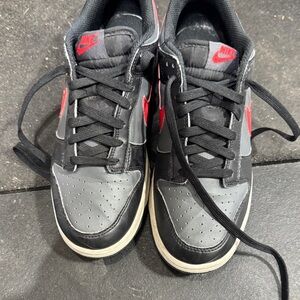 Nike Kids Black and Gray Sneakers with Red Accents